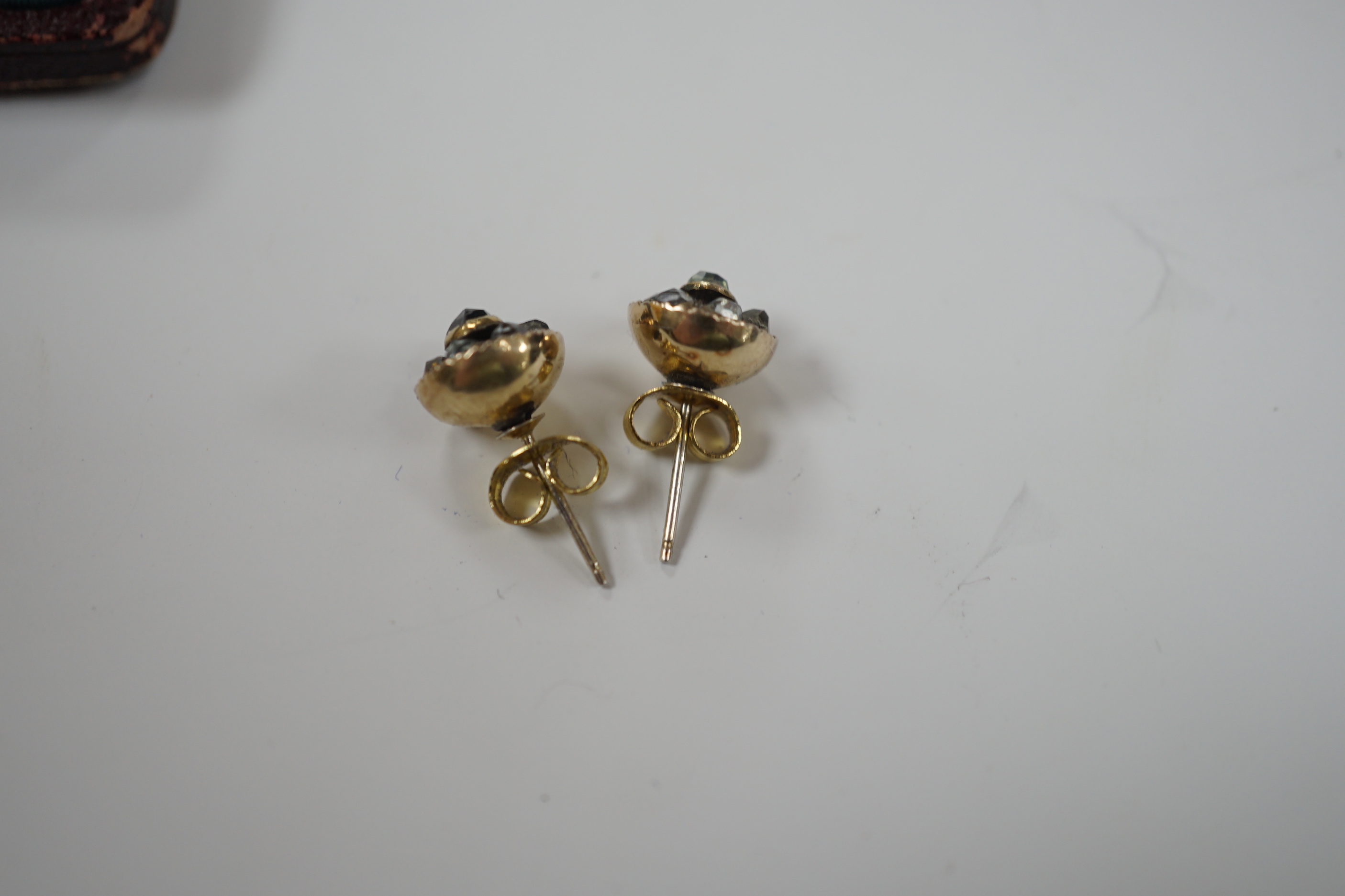 A pair of antique yellow metal and paste cluster set ear studs, diameter 9mm.